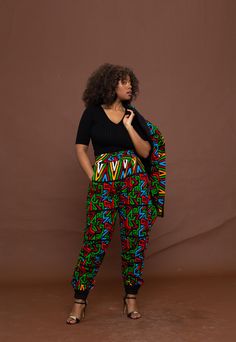 * Ankara High waist trouser with side pockets. *Trouser has elastic at the waist and ankle; lined with plain black cotton fabric. * Trouser has elastic at the waist and ankle *  Made to suit and flatter different body types. Ready to ship, will be dispatched within  5-7  working days after order your has been placed. *Rush service also available; please send us an email. A copy of our size chat has  been added to photo collage, please check your size before placing your order, as we will not be Trousers Outfit Ankara, Chitenge Trousers For Ladies, Ankara Pants High Waist, Ankara Joggers For Ladies, Baggy Ankara Trouser, Ankara Pallazo Trouser, Ankara Trousers Pants High Waist, Ankara Joggers, Ankara Trousers