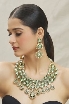 14kt gold plated green necklace made with semi-precious kundan stone embellishments. Comes with a matching pair of earrings. - Aza Fashions Studded Necklace, Jewellery Sets, Green Necklace, Brass Color, 14kt Gold, Aza Fashion, Online Jewelry, Necklace Set, Jewelry Sets