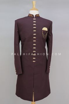 Get the best wedding look with this wine silk indo-western for an ethnic look. Paired with elegant buttons designs and stonework. Detailed with a stand collar, and full placket, and hook and button opening. Comes with contrast beige color pants. Designer Fitted Bandhgala With Buttons, Traditional Fitted Bandhgala With Buttons, Traditional Fitted Sherwani With Buttons, Festive Bandhgala With Buttons, Traditional Formal Bandhgala With Buttons, Traditional Bandhgala With Buttons For Formal Occasions, Traditional Festive Bandhgala With Buttons, Elegant Sherwani With Dori Work For Eid, Bollywood Style Burgundy Traditional Wear For Wedding