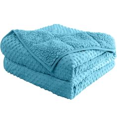 a blue blanket folded on top of each other