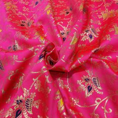 "**Jacquard Brocade Fabric by the Yard ** Listing is for Brocade fabric by the yard piece. This is a beautiful Jacquard woven brocade indian ethnic pattern fabric . The fabric features golden Lurex weaves with Hot Pink ground along with Navy blue & Yellow Motif tread . This fabric looks stunning with combination of different color and metallic film tread. Width : 50\" Length: 1 Yard Fabric Type: Poly Silk Brocade You can use this fabric to make Christmas decoration, Women Dresses, Tops, Blou Brocade Lehenga, Pink Ground, Golden Thread, Type Art, Lehenga Skirt, Fabric Diy, Boho Fabric, Sewing Ribbon, Sari Fabric