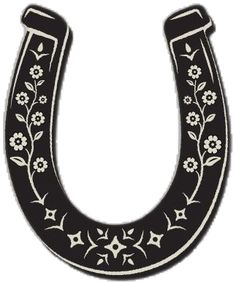 a black and white horseshoe with flowers on it