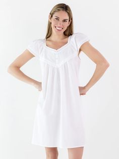 The Valerie Nightgown, a divine combination of elegance and charm, features 3 decorative buttons down the front and its adorable short sleeves are adorned with beautiful lace trim. It exudes feminine and grace and is a great style for every season of the year. White Cotton Nightgown, Nightgown Lace, Cotton Nighties, Cotton Nightgown, Seasons Of The Year, Decorative Buttons, Trim Detail, Above Knee, Night Gown