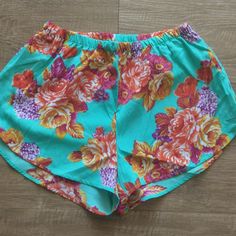 12" Waist Unstretched, 13" Top To Bottom 2" Inseam Cute, Lightweight Fabric Elastic, Stretchy Waist Short Pajama/Lounge Shorts Send Me Offers & Trades Vibrant Blue Bottoms For Vacation, Vibrant Blue Bottoms For Spring, Vibrant Blue Spring Bottoms, Green Floral Print Shorts For Beach Season, Stretch Turquoise Summer Shorts, Turquoise Bottoms For Spring Vacation, Spring Vacation Turquoise Bottoms, Turquoise Beachwear Bottoms For Spring, Crochet Lace Shorts