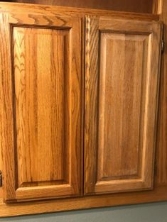 the cabinets are made of wood and have no doors