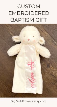 This is a personalized embroidered lamb lovey for baby gift such as baptism gift, Christening gift, Dedication Ceremony gift for baby.  The size is: 11 inches tall. Organza drawstring bag included. Magnetic Keepsake Gift Box available as an upgrade.  Customize this baby gift with baby's first name.  ✨ FEATURES  - 11 inches tall - Baby Safe - Embroidered details - Velcro loop at the back (see listing video) - Satin lining - 100% polyester - Gift box included - Machine wash cold cycle, dry low heat Godbaby Gifts, Baptism Gifts For Baby Girl, Baby Girl Baptism Gift, Boy Baptism Gift, Elegant Embroidered Baptism Sets, Baby Dedication Gifts