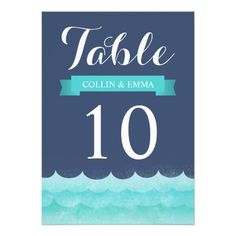 a table number card with the words table 10 in blue and black watercolors