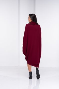 "Sweater Dress, Wool Dress, Long Sleeve Dress This extravagant and designer sweater dress has two an asymmetric design, turtleneck and long sleeves. Warm and cozy a fabulous piece for the new season. The model in the picture is 168cm. ⅼ 5.6 ft. tall and is wearing size S / color: Burgundy 🌟 INFO: * Worldwide EXPRESS shipping - please provide a phone number for shipping documents * US Sizing XS to 4XL - body size chart available below * We offer customization to Personal Measurements & Large Shipping Documents, Long Sleeve Dress Winter, Loose Sweater Dress, Asymmetric Jacket, Designer Sweater, Unique Sweaters, Dress Winter, Loose Knit Sweaters, Plus Size Coats