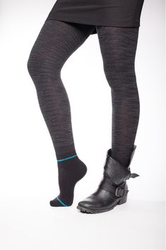 Cozy sweater tights with wool socks attached. Perfect for layering for skiing (wear them as base wear for outdoor sports). Wool keeps feet dry and warm. Multi-use - for fashion and sport. Features Attached ankle wool sock works with all boot styles Provides natural moisture management and temperature regulation Unique Free Run pattern keeps you stylish and toasty warm Wear as base layer to add texture and pattern to any outfit Benefits Luxury legwear meets wool performance sock for the ultimate Winter Compression Casual Tights, Casual Compression Tights For Winter, Casual Winter Compression Tights, Sporty Knee-high Socks For Winter, Sporty Knee-high Winter Socks, Fitted Winter Outdoor Socks, Winter Outdoor Fitted Socks, Sporty Stretch Knee-high Socks For Winter, High Stretch Casual Winter Tights