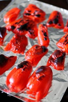 red peppers are on tin foil and ready to be baked in the oven or used as an appetizer