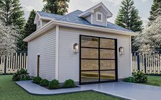 a small white shed with a black door and windows