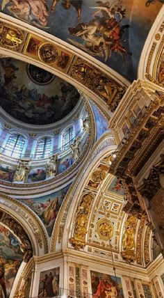 an ornate ceiling with paintings on it