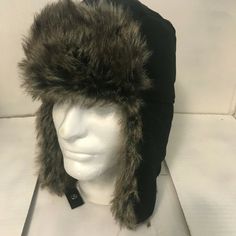 Casual Windproof Winter Hat, Casual Winter Hat With Ear Flaps, Winter Outdoor Hats With Short Brim, Casual Hats With Fleece Lining For Winter Sports, Casual Windproof Hat With Ear Flaps, Casual Windproof Hat, One Size Fits Most, Casual Winter Sports Hats With Fleece Lining, Black Fleece-lined Hats For Winter Sports, Hooded Hats For Outdoor Fall Activities