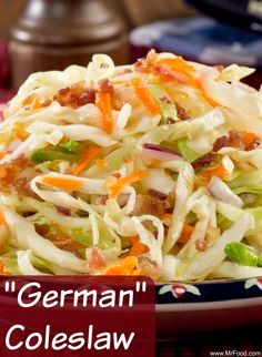 a close up of a plate of coleslaw on a table with the words, german coleslaw