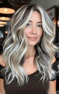 Need some hair inspo? Look no further! These platinum blonde looks are perfect for anyone wanting to make a bold statement. Click here to see the ultimate hair goals! Gray Balayage With Money Piece, 3 Tone Blonde Hair, Winter Hair Color To Hide Grey, Face Framing Platinum Highlights, Long Hair Color Ideas Blonde, Blonde And Brown Chunky Hair, Platinum And Lowlights, White Blonde With Dark Lowlights, Chunky Icy Blonde Highlights