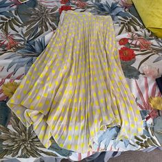 White/Gray Midi Skirt With Yellow Polka Dots. Never Worn. Size Medium Polka Dot Pleated Skirt For Spring, Yellow Pleated Skirt For Day Out, Spring Yellow Pleated Bottoms, Chic Yellow Pleated Bottoms, Summer Yellow Pleated Skirt, Yellow Pleated Long Skirt, Yellow Pleated Midi Skirt, Casual Yellow Zara Skirt, Zara Multicolor Vacation Skirt