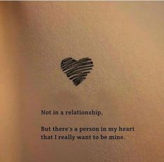 a piece of paper with a heart drawn on it that says not in a relationship but there's a person in my heart that i really want to be mine