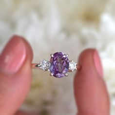 With a brilliant cut like that, this ring is nothing but pure brilliance in itself. With a lovely Amethyst, the Khloe ring with two side moissanites, sparkles like there is no tomorrow. Celebrate your milestones or special occasions with this ring as the perfect gift for sisters as a best friend's gift, or just as an everyday celebration of life in general. Details: Center stone Gemstone: Amethyst Stone Shape: Oval Measurements: approx. 9x7mm Side stones Gemstone: Moissanite Shape: Round Measure There Is No Tomorrow, Oval Amethyst Ring, Purple Stone Rings, No Tomorrow, Amethyst Ring Engagement, Amethyst And Diamond Ring, Rose Quartz Ring, Amethyst Jewelry, Gifts For Your Girlfriend