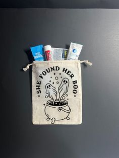 a bag with toothpaste and other items in it