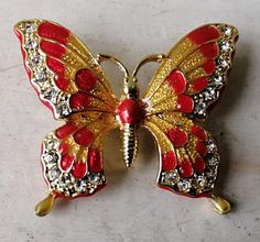 Beautiful Vintage Enamel gold tone Butterfly Brooch, Gift for Her. Quality red and gold enamelling, edged with faux diamond stones. Comes with a gift box. The pin is intact and has a safety clasp.The brooch is in very good condition with no wear. The enamel is bright and undamaged and it looks new and unused.Really elegant item.Brooch measures approx. 4.5 x 3.5 cm This would be perfect for a collector or a lovely gift!(Free postage for UK. I will always combine postage for international buyers i Vintage Green Glass, Wood Jewelry Box, Butterfly Brooch, Unique Gifts For Her, Gold Enamel, Wood Jewellery, Red And Gold, Diamond Stone, Lovely Gift