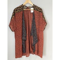 Umgee Semi-Sheer Mixed Animal Print Kimono Cardigan Women's Size M/L Beachy Cover-Up Boho. In Excellent Condition! No Flaws Flat Lay Measurements: Shoulder - ~36 Bust -~35 Length - 31" *Please Contact Me With Any Concerns Or Problems With Your Transaction. I Will Try My Best To Resolve The Problem.* Thank You! Be Sure To Check Out My Other Listings For Deals That May Appeal To You. Brown V-neck Summer Cardigan, Summer Open Front Tops For Layering, Summer Floral Print Casual Cardigan, Casual Summer Floral Print Cardigan, Casual Floral Print Summer Cardigan, Casual Brown Cardigan For Beach, Casual Brown Cardigan For The Beach, Summer Beach Brown Cardigan, Trendy Brown Summer Cardigan