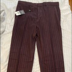 Brand New With Tags Burgundy And Red Pinstripe Trousers . Made For A Cropped Look Depending On Height . Very Stylish And Can Be Worn Dressed Up Or Down . Formal Striped High Waist Bottoms, Fitted Striped Dress Pants With Welt Pockets, Striped Fitted Bottoms With Tapered Leg, Fitted Striped Pants With Welt Pockets, Fitted Straight Leg Bottoms With Vertical Stripes, Fitted Striped Bottoms With Welt Pockets, Fitted Bottoms With Vertical Stripes And Straight Leg, Fitted Straight Pants With Vertical Stripes, Fitted Trousers With Vertical Stripes