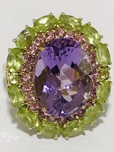 VINTAGE 10K Gorgeous one-of-a-kind Solid Gold Natural Amethyst Peridot Stone Ring CID Thailand Vintage Size 8  Total weight 7.7 g  main stone measurement 16.16 mm x 12 mm . This ring is size 8 and cannot be resized because of the stone setting if you try resize it to your professional jeweler it my damage permanently the ring and you cannot return it back to us . Please ask any question regarding this item before purchasing  We do combine shipping, shipping only U.S.A 48 states  NO international Oval Multi-stone Peridot Gemstones, Formal Green Amethyst Ring With Accent Stones, Formal Green Amethyst Ring With Gemstone Accents, Luxury Multicolor Amethyst Ring For Anniversary, Oval Peridot Multi-stone Jewelry, Green Amethyst Ring For Formal Occasions, Multicolor Oval Amethyst Ring, Multicolor Oval Amethyst Ring With Gemstone Accents, Fine Jewelry Oval Multi-stone Amethyst Ring