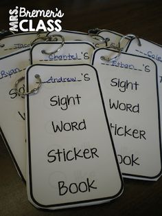 four white tags with black writing on them that read sight word sticker bookmarks