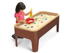 Brown and tan earth tones create the perfect natural setting for hours of open-ended sand & water play! This classroom-tough table is made from all-weather plastic and features super-safe rounded edges, a handy plug for draining, a top for storage and a removable plastic liner that pops in and out in a snap. Easy assembly. Table measures 46 1/2"l x 22"w x 18"h. Sand Water Table, Multicultural Activities, Water Table Activities, Lakeshore Learning, Sand And Water Table, Water Tables, Assembly Table, Stem Kits, Sand Table