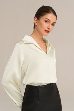 Experience the epitome of elegance with our Satin Blouse. Combining a loose fit with a smooth and comfortable fabric, this blouse is designed to make you feel effortlessly stylish. With long sleeves, a flattering V-neck, and a lapel collar, this piece exudes timeless charm. Material : 95%Polyester+5%Elastane.Elasticity : Low Stretchy.Sku : CL2156A23Package : 1*TopsCare instructions: Max wash temp: 30℃, No bleach, No tumble dry, Iron max 110℃, Wash dark colors separately, No PU ironing. Formal V-neck Solid Color Tops, Elegant Collared Tops In Solid Color, Beige V-neck Blouse For Office, Chic Solid Color V-neck Shirt, Elegant Long Sleeve Top For Fall, Elegant Solid Color V-neck Tops, Elegant Solid Color Shirt For Spring, Elegant V-neck Top, Elegant V-neck Blouse In Solid Color