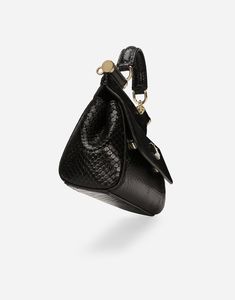 Small python skin Sicily handbag: Black Front flap with hidden double magnetic fastening Branded tag featuring two metal plated finishes Top handle and adjustable, detachable strap in python skin Nappa leather lining and flat pocket Item comes with a branded dust bag Measurements: H13 x W19 x D6 cm Made in Italy Handbags Black, Python Skin, Bag Measurements, Handbag Black, Brand Tags, Nappa Leather, Black Handbags, Sicily, Python