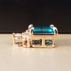 "Emerald Pendant Custom made in all 14k 🌹 Rose Gold, set with three sparkling Genuine Diamonds totaling .38cts. Featuring a Beautiful Lab Grown Emerald measuring in at 9X7mm all set prong style with a hidden bail. A unique twist on a timeless design, perfect for layering with your favorite pendants. **.38ct of Natural Diamonds **This listing is for the pendant only. **Emerald is the official May Birthstone and Diamond is the official April Birthstone. Please feel free to contact me anytime, if Rose Gold Cubic Zirconia Three Stone Jewelry, Rose Gold Three Stone Cubic Zirconia Jewelry, Rose Gold Three Stone Jewelry For Gift, Rose Gold Three Stone Jewelry Gift, Rose Gold Three Stone Jewelry As A Gift, Fine Jewelry In Rose Gold With Three Stones, Rose Gold Three Stone Fine Jewelry, Fine Rose Gold Three Stone Jewelry, Formal Rose Gold Three Stone Jewelry