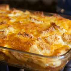 a casserole dish is sitting on the stove top, ready to be eaten