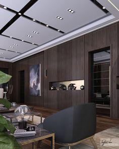 a modern living room with wood paneling and lighting