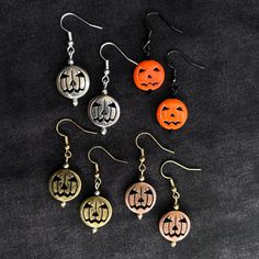 Hello, welcome to my Etsy shop! Thank you for stopping by, happy to have you here! It's Spooky Season babes! These spooky dangle earrings are made with beautiful metal pumpkin beads, and small metal/plastic beads, the earring hooks are iron and nickel-free. There is limited availability, only 1 of each color will be available.  **Approx. Size** - Dangle: 1 in - The highest point to the bottom: 1 3/8 in Ear Wires:  Color: Silver - Iron - Nickel Free  Color: Shiny Silver - Iron Color: Gold - 100% Iron **Earring Care** - Avoid pulling the earrings - Avoid hitting against hard surfaces - Store in a dry area or box - Clean with a soft brush - Use a damp cloth to clean, followed by a dry jewelry/microfiber cloth Please note: Since these are stone beads, they won't always be identical, however, I Fun Nickel-free Jewelry For Halloween, Adjustable Nickel-free Earrings For Halloween, Pumpkin Beads, Silver Pumpkins, Metal Pumpkins, Pumpkin Bead, Earrings Halloween, Pumpkin Earrings, Glass Pumpkins