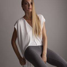 Nwt - This Casual Hi-Low Tee Is Made From Super Soft Modal Fabric. Front And Back Center Seam With Raw Edge Arms And Hem Give Nice Details To This Relaxed Oversized Top. Front Length Is 4 Inches Shorter Than Back Length. Modal Jersey - 95% Modal / 5% Spandex Model Is 5'9" And Wearing A Size Small. Effortless Stretch Tops For Everyday, Casual White Stretch V-neck Top, Relaxed Stretch Tops For Layering, Relaxed Stretch Tops For Everyday, Versatile Relaxed Fit Tops For Loungewear, Versatile Relaxed Fit Top For Everyday, Relaxed Fit Versatile Top For Everyday, Versatile Tops With Relaxed Fit For Everyday, Versatile White Everyday Top