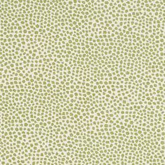 a green and white wallpaper with small dots