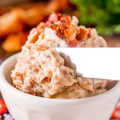 a white bowl filled with mashed potatoes and bacon