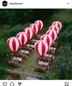 several red and white hot air balloons in the shape of cars