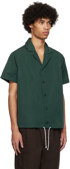 Cotton poplin shirt. · Open spread collar · Button closure · Patch pocket at chest · Drawstring at hem Supplier color: Dark green Dark Green Shirt For Men, Mens Green Button Up, Green Palm Mens Shirt, Green Unstructured Cotton Shirt, Drawstring Shirt, Green Cotton Button-up Camp Shirt, Cotton Poplin Shirt, Poplin Shirt, Cotton Poplin