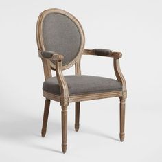 an old wooden chair with grey upholstered seat and armrests, on a white background