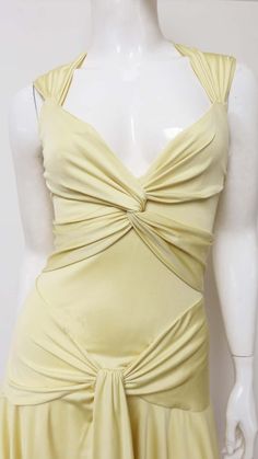 For Sale on 1stDibs - A gorgeous yellow fine silk knit dress by Valentino. It is semi fitted, sleeveless with a V neckline and ruched panels across the bust and hips. The skirt Yellow Silk Dress, Silk Yellow Dress, Bright Yellow Dress, Valentino Dress, Evening Gown Dresses, Yellow Silk, Silk Knit, Panel Dress, V Neckline