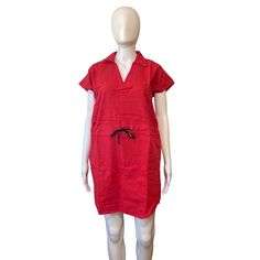 Introducing A Vibrant Red Mini Popover Dress From Never A Wallflower In Size Xs. This Dress Features Short Sleeves, A V-Neckline, And A Drawstring Closure. It Is Made Of High-Quality Linen Fabric That Is Both Durable And Breathable. The Dress Is Perfect For A Variety Of Occasions, Including Travel, Parties, And Casual Outings. The Solid Pattern And Woven Fabric Type Give The Dress A Preppy And Colorful Theme That Is Sure To Turn Heads. The Dress Length Is Short, Making It Ideal For Warmer Weathe Red Knee-length Cotton Mini Dress, Red V-neck Cotton Mini Dress, Casual Red Cotton Dress, Casual Red Dresses With Pockets, Casual Red Dress With Pockets, Red V-neck Mini Dress For Daywear, Red Mini Dress For Daywear, Red Short Sleeve Cotton Mini Dress, Casual Red Mini Dress For Daywear