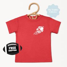 Free Shipping- always! Get ready for football season in Columbus, Ohio! Your toddler will look awesome cheering on his favorite team in the 'Shoe! Not seeing a design you like for gameday? Send us a message + let us know if we can can customize your vision! Thank you for supporting our small, toddler mama + family run business! We love being able to provide you with trendy designs to make your kiddo the coolest on the block! The Bella Canvas short sleeve tee for toddlers is a 100% Airlume combed Red T-shirt With Name Print For Game Day, Red Sports Fan T-shirt For Cheerleading, Game Day Red T-shirt With Name Print, Red Name Print T-shirt For Game Day, State Of Ohio, Retro Football Shirts, Retro Football, Can Can, Columbus Ohio