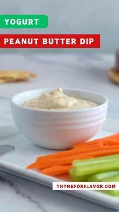 carrots and celery sticks on a plate with dip