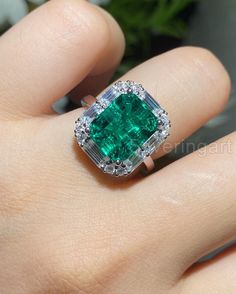 Huge Quality Octagon Emerald & Baguette Diamond Engagement Ring, White Gold Ring, May Birthstone Emerald, Thanksgiven Ring, Dainty Halo Ring Ring information: Main stone : Natural Emerald & Diamond  Metal type:  Yellow Gold Stone Cut / Shape : Faceted / Octagon & Baguette, Round Birthstone : May Month Metal stamp / Hallmarked : Yes Certificate : Yes This listing is only for one ring * Customization is always welcome and please feel free to contact with me if you have any design ideas! IMPORTANT: Luxury Gia Certified Emerald Cut Gemstones, Luxury Diamond Ring With Emerald Accent Stones, Luxury Octagon Emerald Ring With Prong Setting, Octagon Emerald Ring In Platinum, Fine Jewelry, Octagon Emerald Ring In Platinum, Platinum Octagon Baguette Diamond Jewelry, Luxury Emerald Gemstones With Accent Stones, Emerald Cut Diamond Fine Jewelry, Gia Certified Octagon Emerald Ring