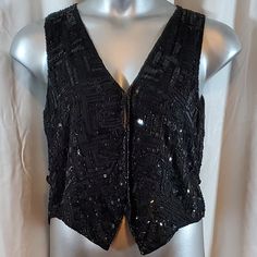 Black Silk Sequin Vest/Shirt Size Petite Medium 100% Silk From Smoke Free Pet Free Home Condition Is Pre-Owned Excellent Festive Black V-neck Top, Black Tops For Christmas Party, Fitted Christmas Evening Tops, Black Party Tops For Christmas, Black Christmas Party Tops, Black Christmas Party Top, Elegant Black Festive Tops, Black Tops For Festive Party Season, Fitted Black Christmas Top