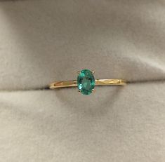 Dainty Emerald Oval Ring Prong Set in 14k Yellow Gold Eye Clean Natural Emerald Ring for Her Birthday Gift for Daughter/Sister/Niece Main Stone : Natural Emerald Origin : Zambian Clarity : Eye Clean(very Rare in Natural Emeralds) Size of Emerald : 6×4mm Ct Weight : 0.55cts. "No Enhancement No Oil Emerald" Emerald can also be Certified upon Request. Dainty ,but One of its Kind Emerald Ring set in 14k Yellow Gold, Perfect Gift for Your Daughter or Sister or any one who adores Beautiful Emeralds. Heirloom Oval Emerald Ring Birthstone, Heirloom Oval Emerald Birthstone Ring, 14k Gold Oval Cabochon Emerald Ring Gift, Dainty Oval Emerald Ring Gift, Yellow Gold Emerald Ring, Oval Cabochon Gift, Oval Yellow Gold Emerald Ring As Birthstone, Dainty Oval Solitaire Birthstone Ring, Yellow Gold Oval Emerald Birthstone Ring, Oval Emerald Ring Stamped 14k Gold