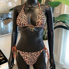 Leopard Print Bikini With Charming Bikinis Charms!The Charming Bikini Charms Are The Newest-Hottest Item Out! They Are Removable Charms So You Can Use Them On Other Bikinis. Brand New! Size Medium Please Ask Questions Before Purchasing No Refunds. Check Out My Other Listings. Brown Triangle Top Swimwear For Pool, Summer Brown Swimwear With Tie-side Bottom, Brown Halter Neck Swimwear, Brown Beachwear Swimwear For Vacation, Summer Brown Tie-side Swimwear Bottom, Brown Triangle Top Swimwear For Beach, Brown Triangle Top Swimwear For Sunbathing, Brown Triangle Top Swimwear For Summer, Brown Halter Neck Swimwear For Pool