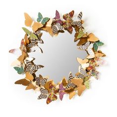 a mirror that has some butterflies on it